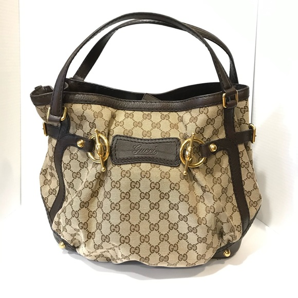 Gucci GG monogrammed canvas and leather handbag - Picture 7 of 16